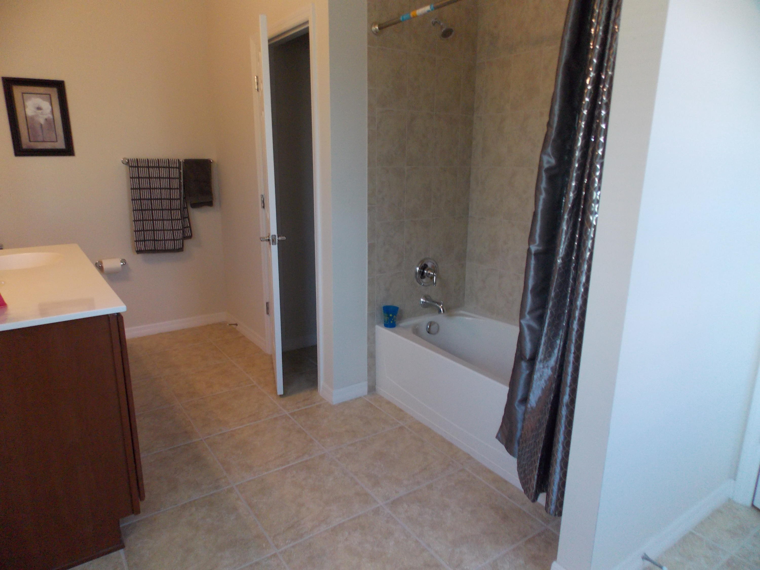 118 Black Ironwood Road, Unit 108 Jupiter, FL 33458 - Photo 15 of 23 Master Guest Bath