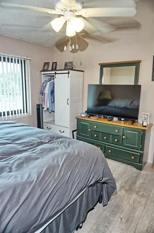 a room with furniture and flat screen tv