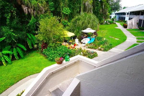a view of a garden with a bench
