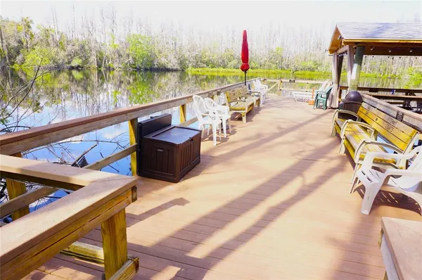 a view of a lake with a deck