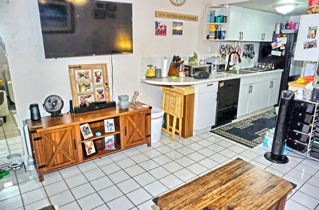 a bedroom with furniture and a table