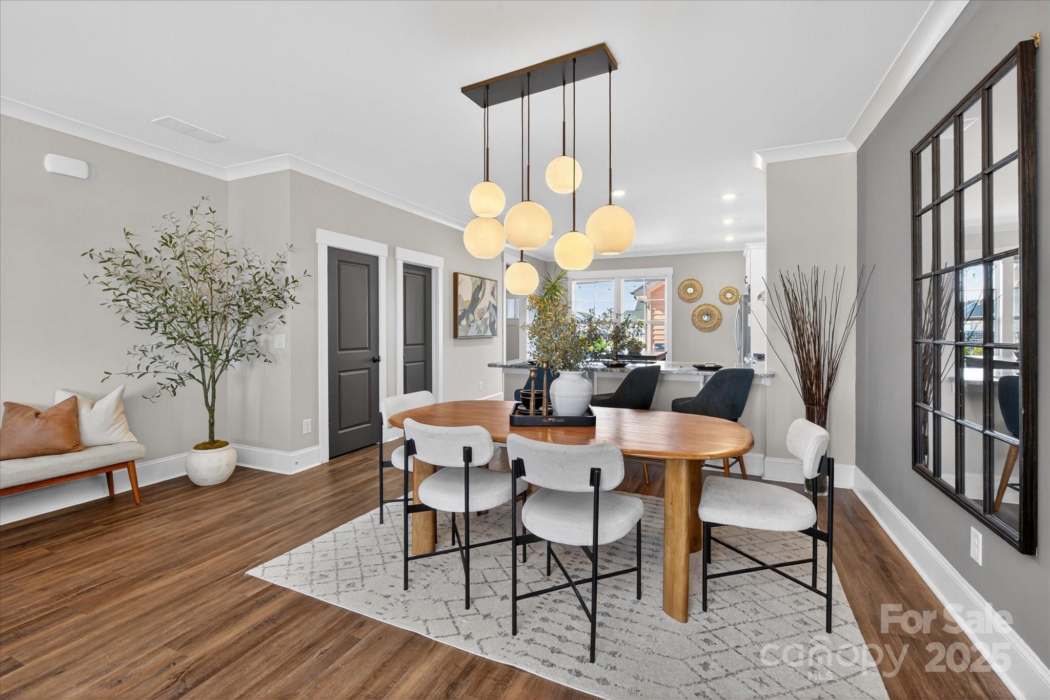676 Dunkins Ferry Road Rock Hill, SC 29730 - Photo 11 of 47 a view of a dining room with furniture and wooden floor