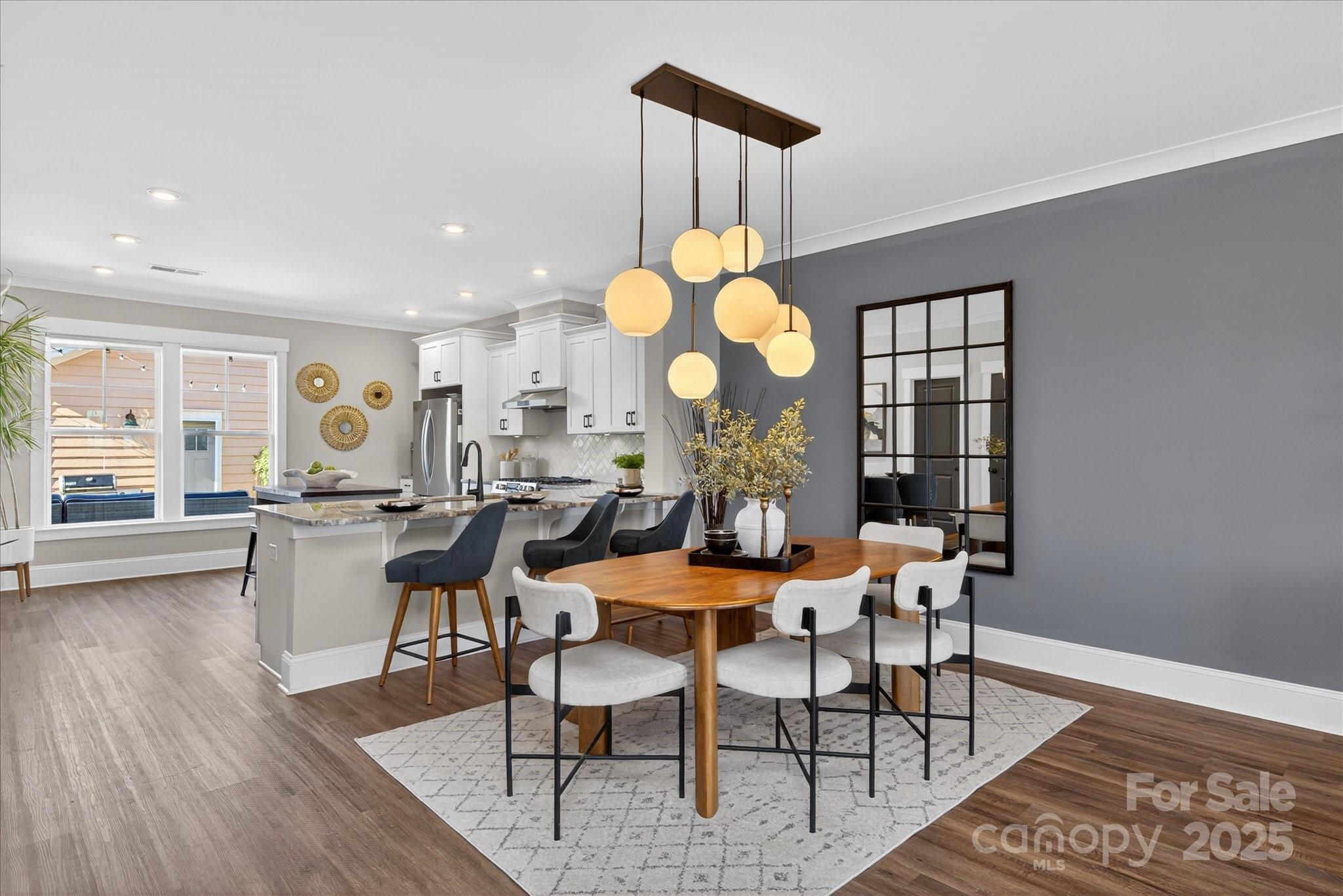 676 Dunkins Ferry Road Rock Hill, SC 29730 - Photo 12 of 47 a dining room filled with furniture and a large window