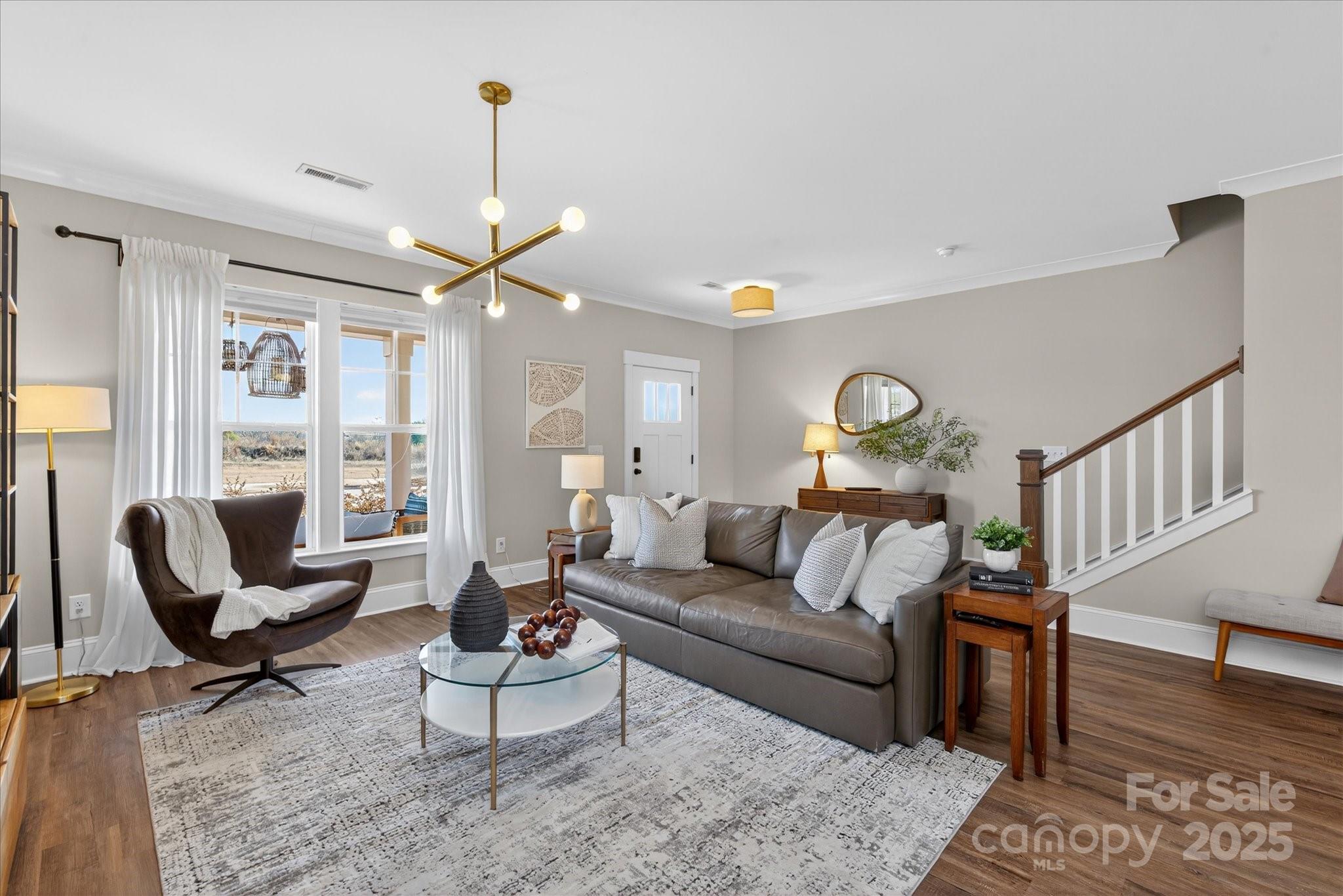 676 Dunkins Ferry Road Rock Hill, SC 29730 - Photo 7 of 47 a living room with furniture and wooden floor
