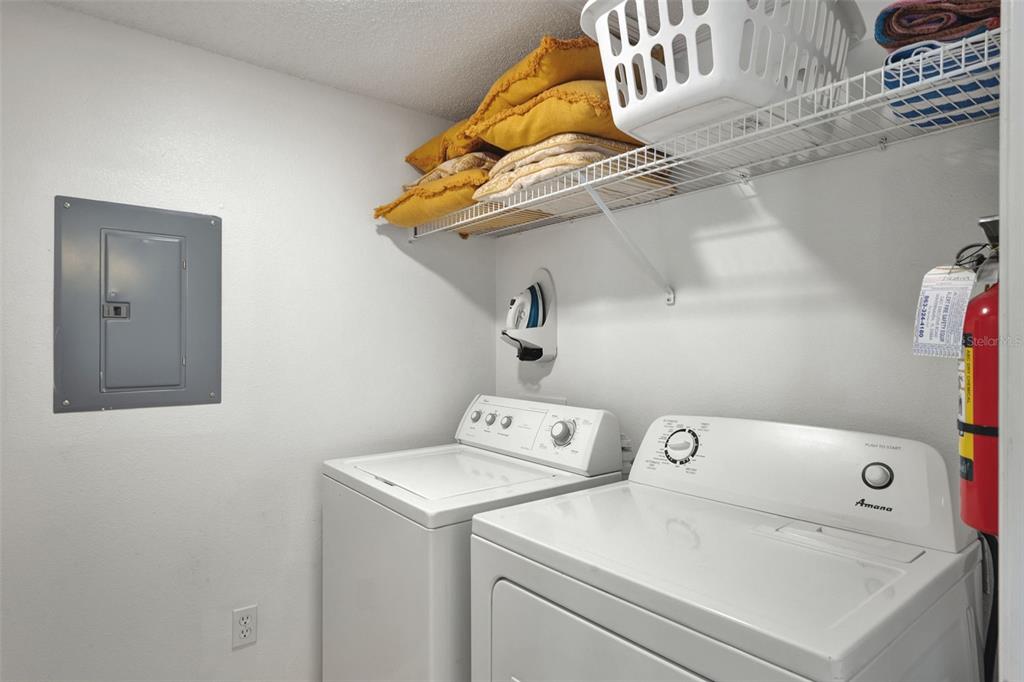 1086 Park Ridge Circle Kissimmee, FL 34746 - Photo 19 of 57 a utility room with dryer and washer