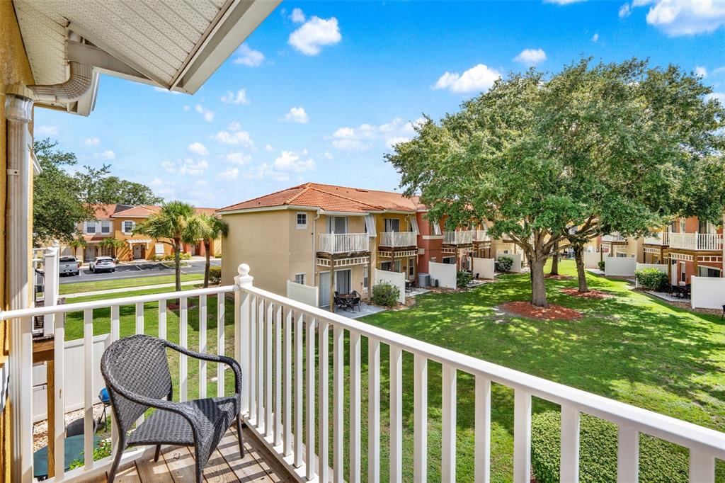 1086 Park Ridge Circle Kissimmee, FL 34746 - Photo 21 of 57 a view of a two chairs in the deck