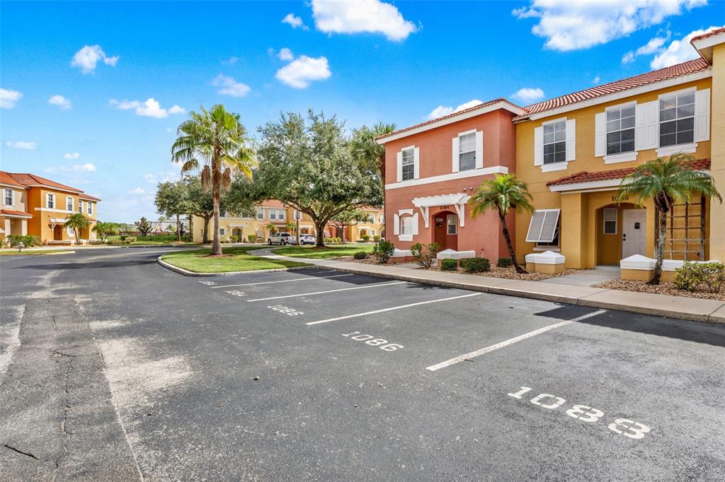 1086 Park Ridge Circle Kissimmee, FL 34746 - Photo 25 of 57 a view of a street with houses on both side