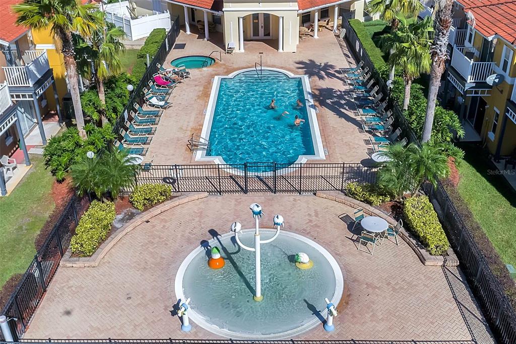 1086 Park Ridge Circle Kissimmee, FL 34746 - Photo 37 of 57 an aerial view of a house with a yard and potted plants