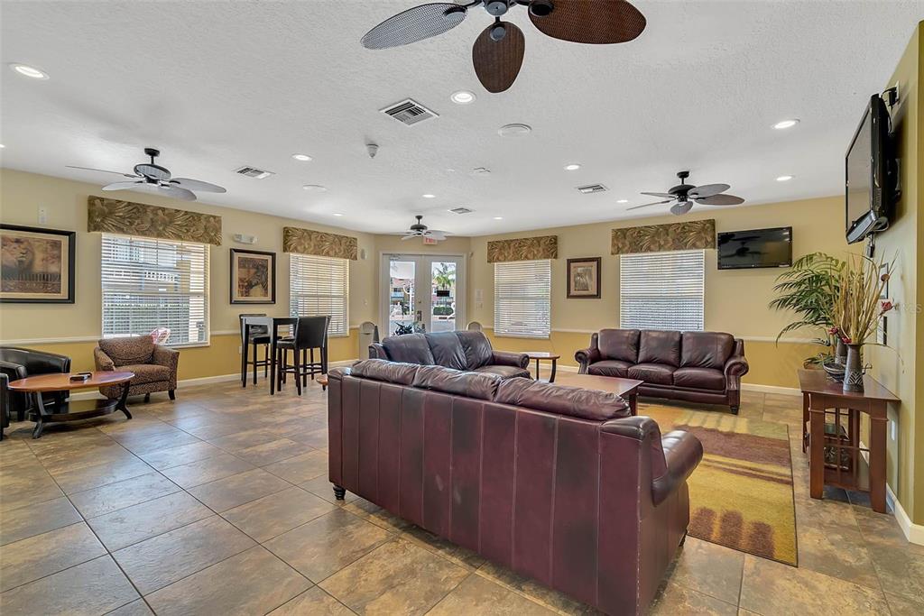 1086 Park Ridge Circle Kissimmee, FL 34746 - Photo 38 of 57 a living room with furniture and a large window