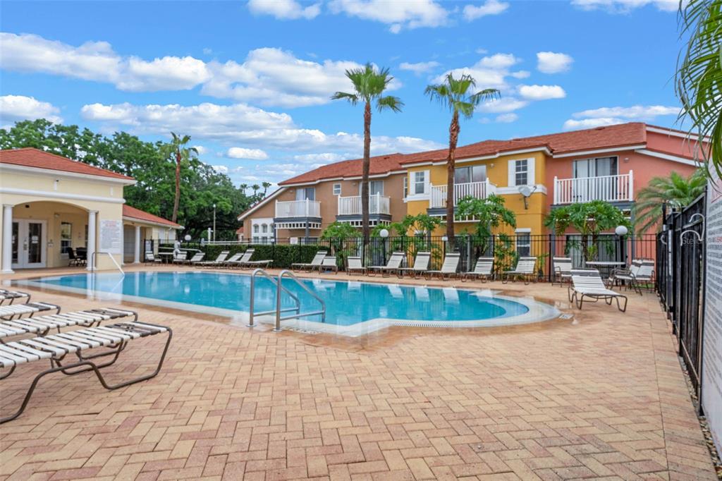 1086 Park Ridge Circle Kissimmee, FL 34746 - Photo 47 of 57 a view of a swimming pool with a patio