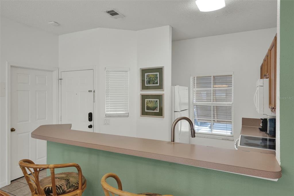 1086 Park Ridge Circle Kissimmee, FL 34746 - Photo 7 of 57 a view of a sink with cabinets