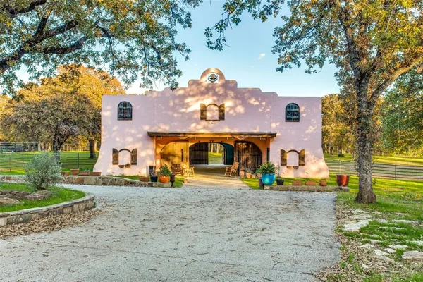 a view of a house with basketball yard