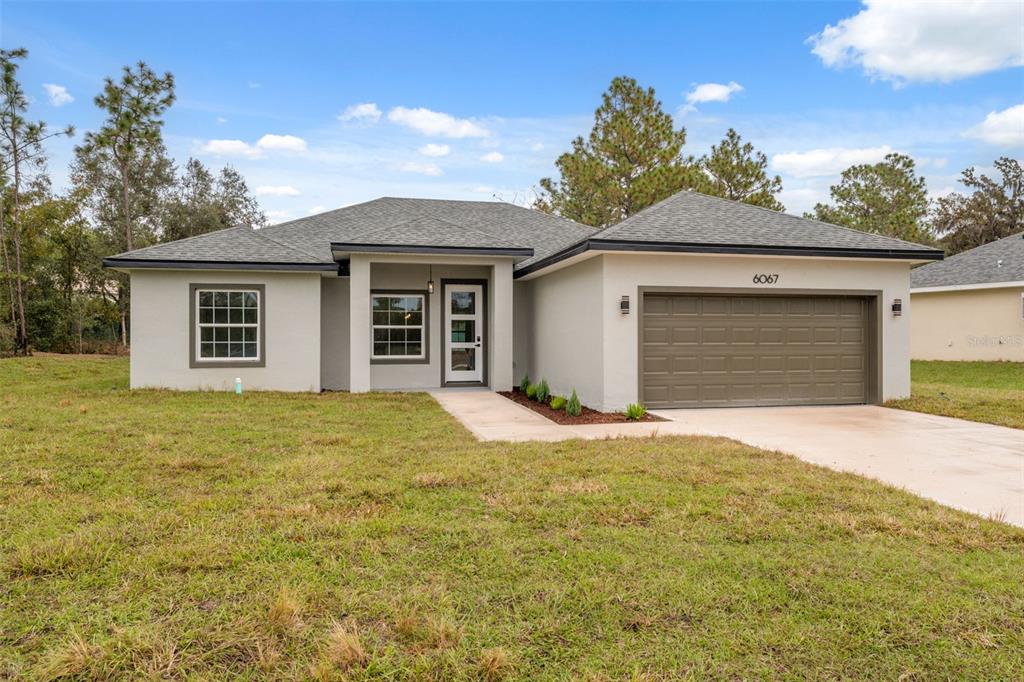6067 Southwest 155th St Road Ocala, FL 34473 - Photo 2 of 33