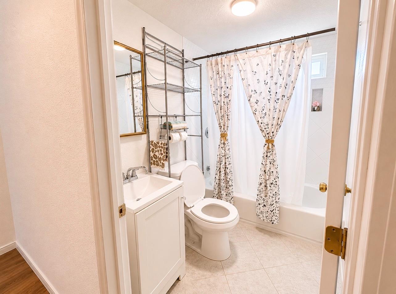 5000 Pierce Road, Unit 32 Bakersfield, CA 93308 - Photo 8 of 15 a bathroom with a sink toilet and shower