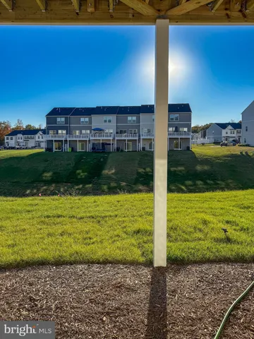 a view of a yard with an outdoor space