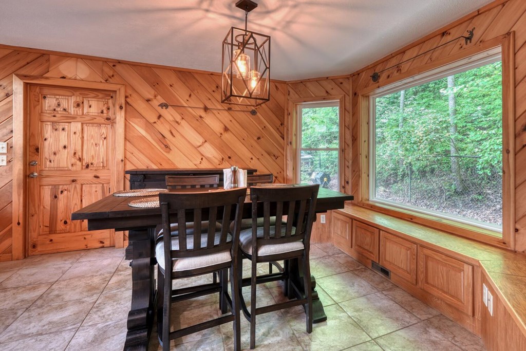 520 Brasstown Road Murphy, NC 28906 - Photo 21 of 61 a view of a dining room with furniture window and outside view