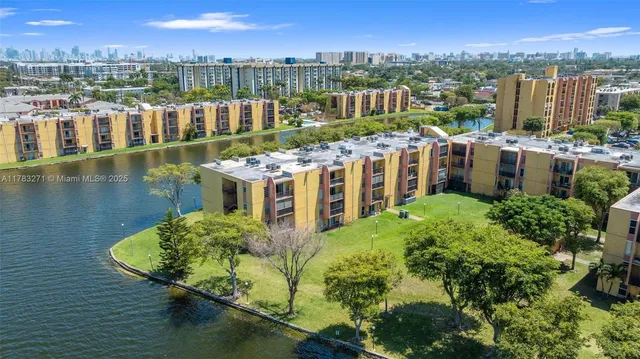 a view of a lake with a building in the background