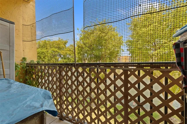 a room with furniture and a flat screen tv