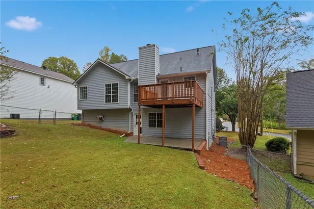 a house view with a garden space