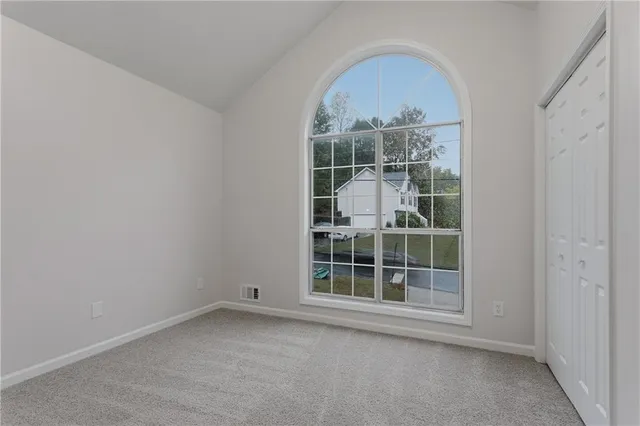 an empty room with window