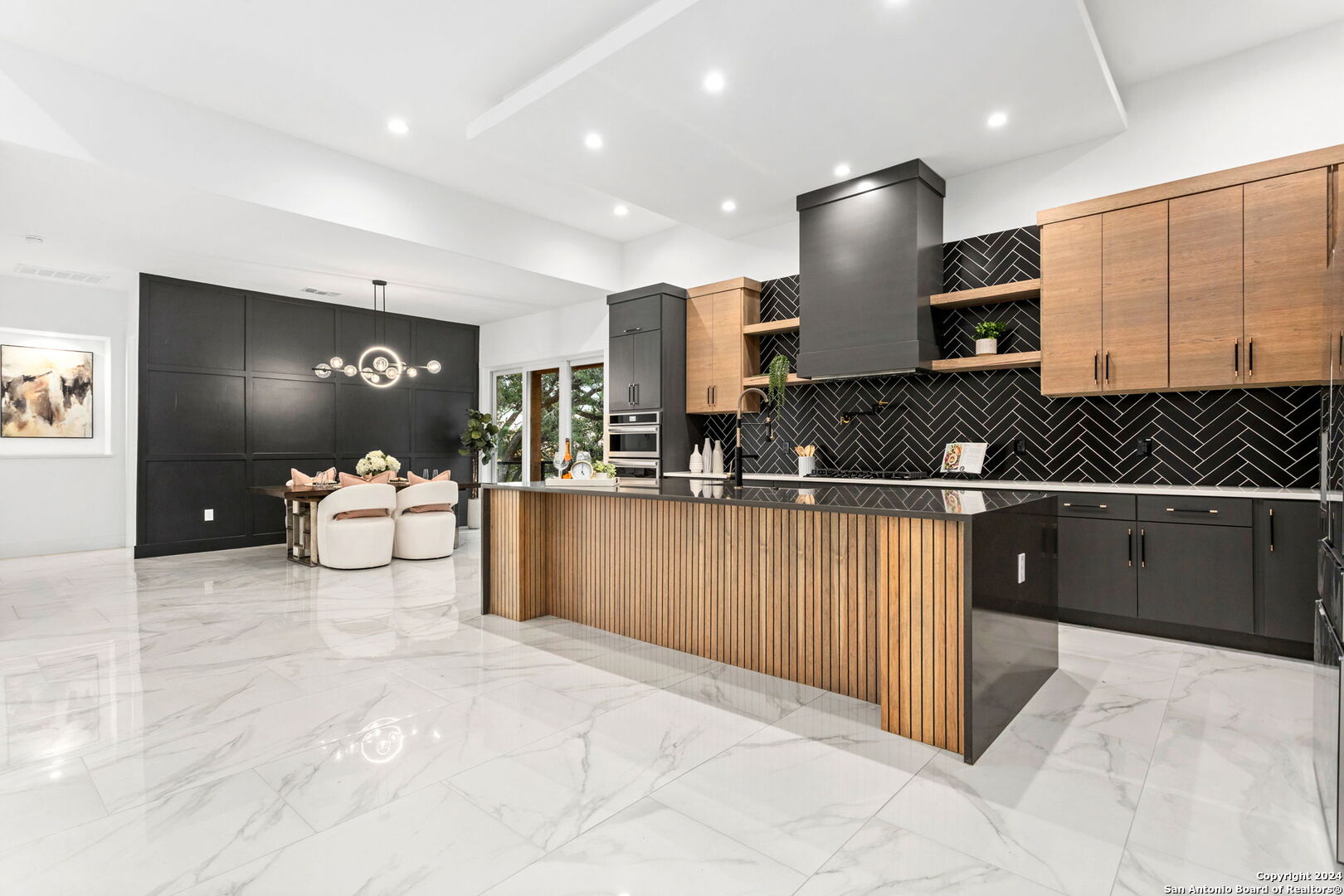 3079 Campestres Spring Branch, TX 78070 - Photo 11 of 38 a living room with stainless steel appliances kitchen island granite countertop a sink and cabinets