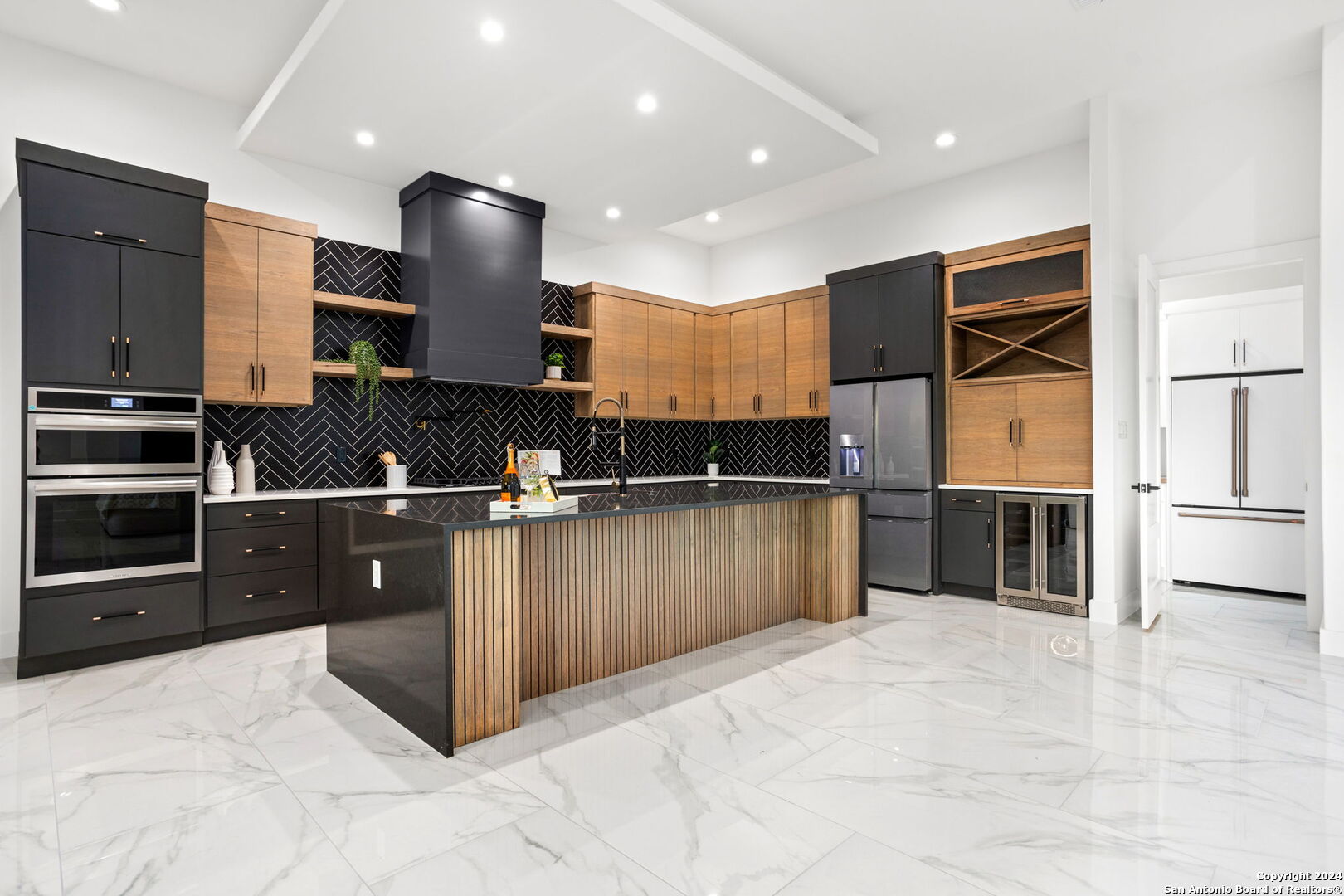 3079 Campestres Spring Branch, TX 78070 - Photo 12 of 38 a kitchen with stainless steel appliances granite countertop a stove and a refrigerator