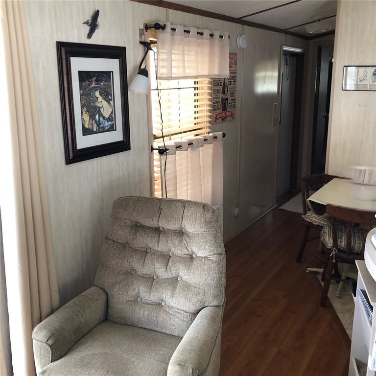 1424 Trout Punta Gorda, FL 33950 - Photo 10 of 32 a living room with furniture and a window