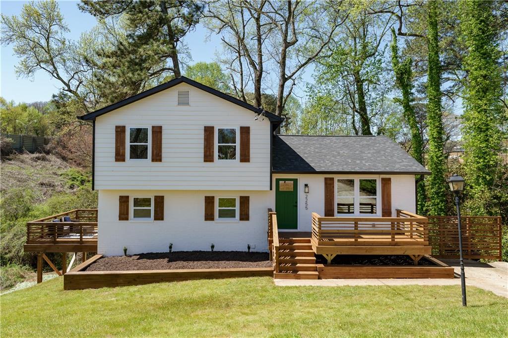 2255 Wallingford Drive Decatur, GA 30032 - Photo 1 of 1 a front view of a house with a yard
