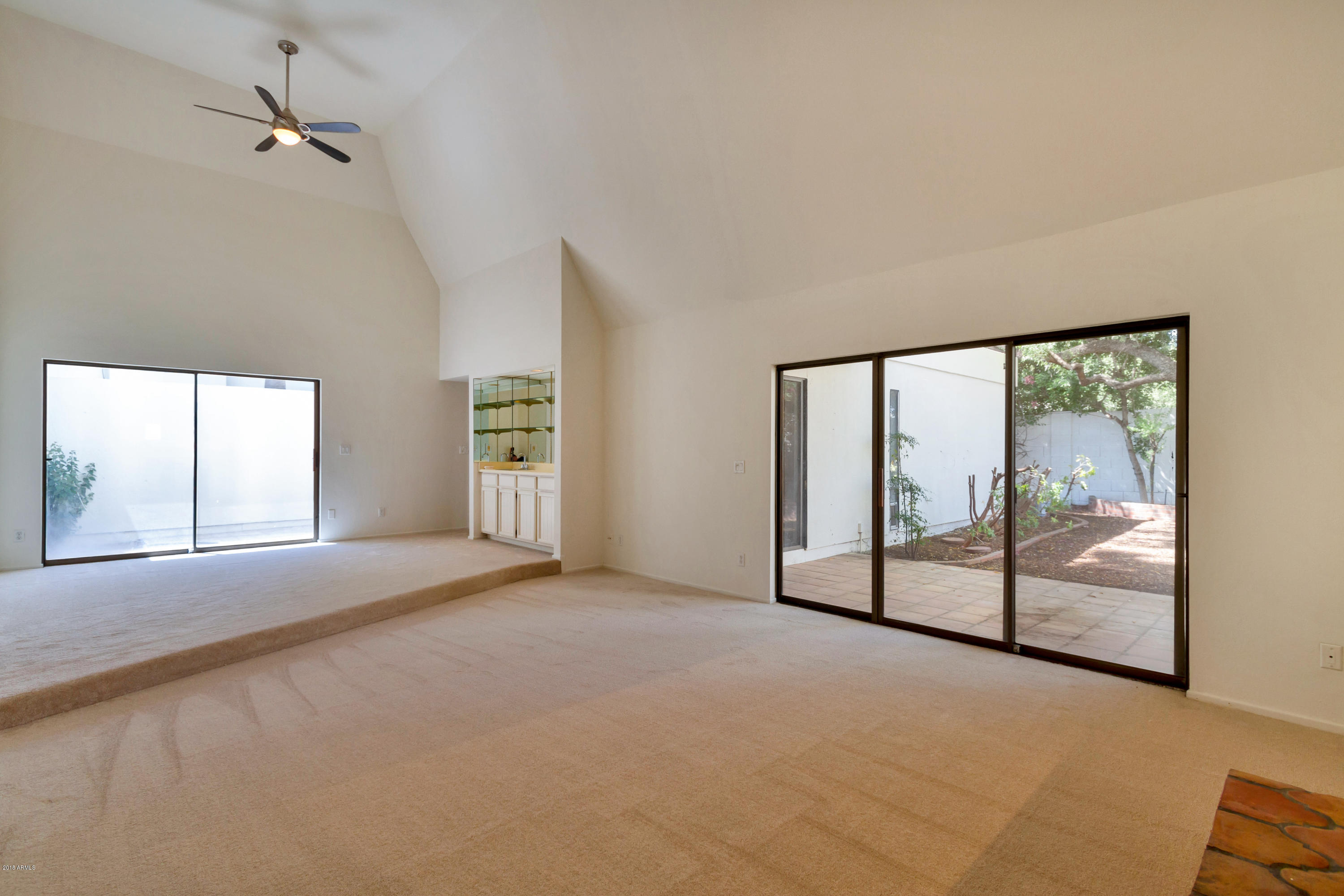 5310 North 24th Place Phoenix, AZ 85016 - Photo 11 of 21 a view of an empty room with a window