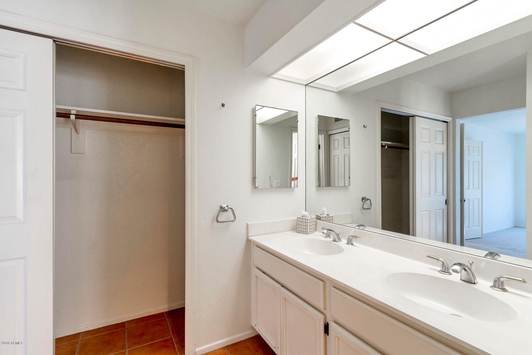 5310 North 24th Place Phoenix, AZ 85016 - Photo 8 of 21 a bathroom with a double vanity sink and mirror