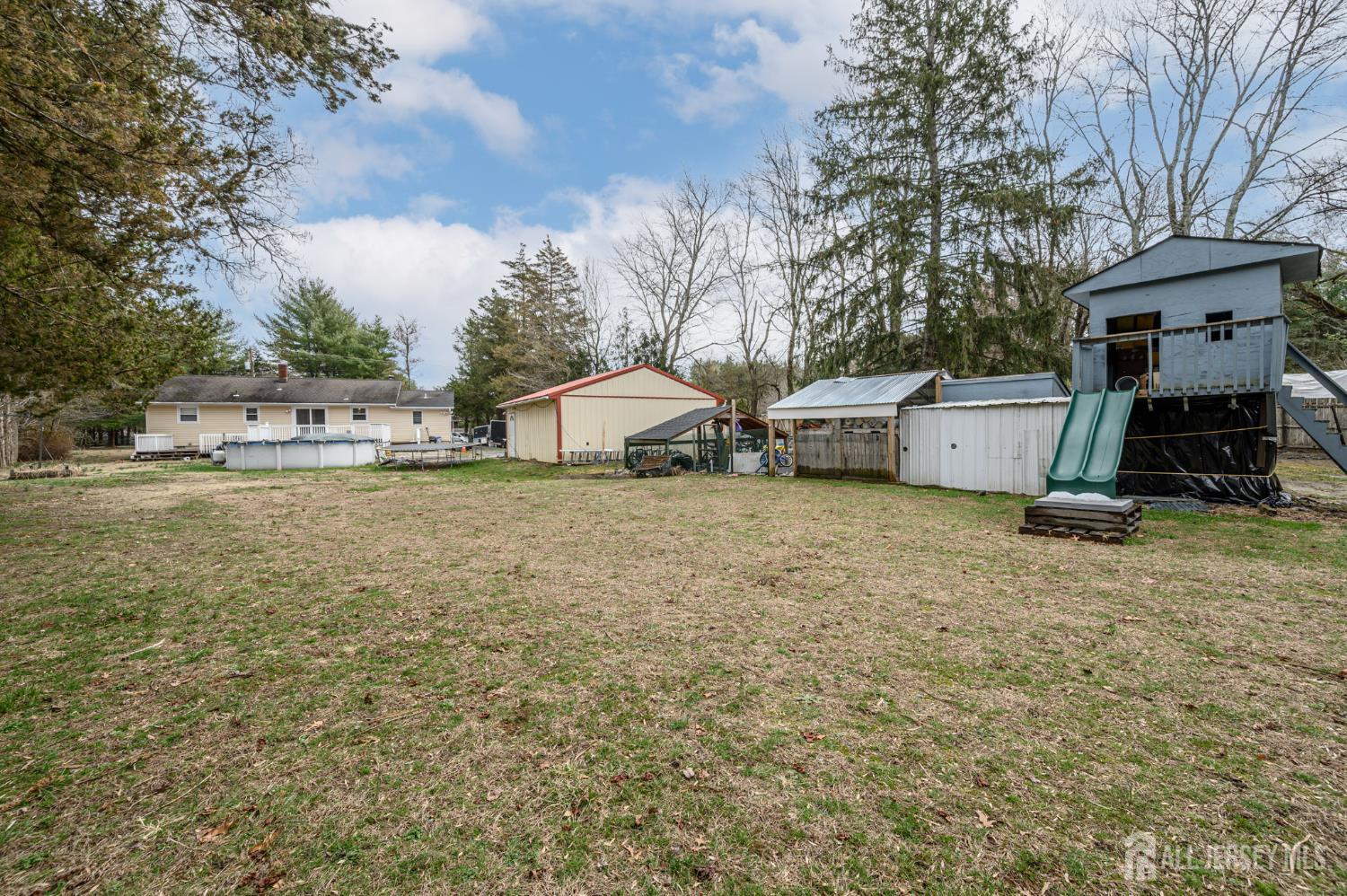 384 Cook Road Jackson, NJ 08527 - Photo 31 of 31 a view of a house with a yard