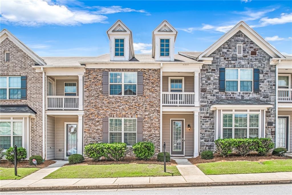 7804 Rutgers Circle Fairburn, GA 30213 - Photo 1 of 1 a front view of a house