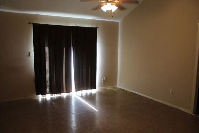 a view of a livingroom with wooden floor