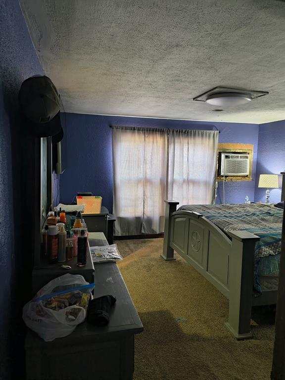 641 22nd Street Southeast Paris, TX 75460 - Photo 8 of 15 a living room with furniture and a fireplace