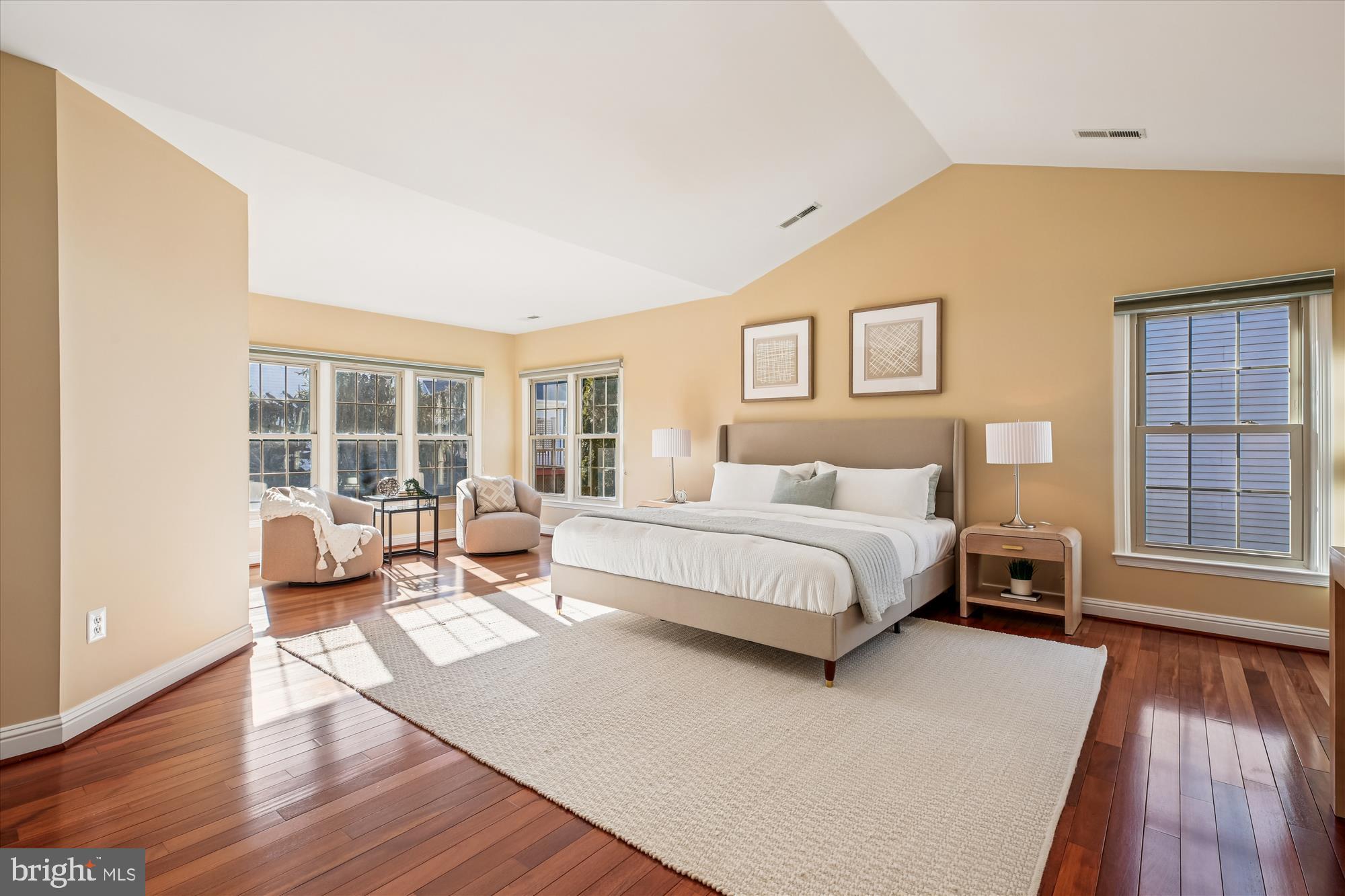 10606 Maplecrest Lane Potomac, MD 20854 - Photo 21 of 47 a spacious bedroom with a bed and wooden floor