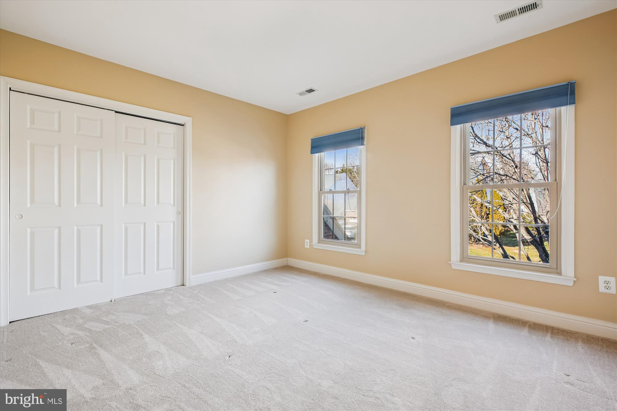 10606 Maplecrest Lane Potomac, MD 20854 - Photo 29 of 47 an empty room with windows and closet