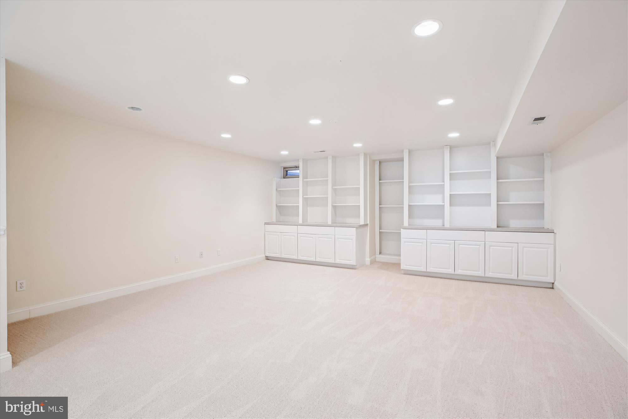 10606 Maplecrest Lane Potomac, MD 20854 - Photo 36 of 47 a view of an empty room with kitchen