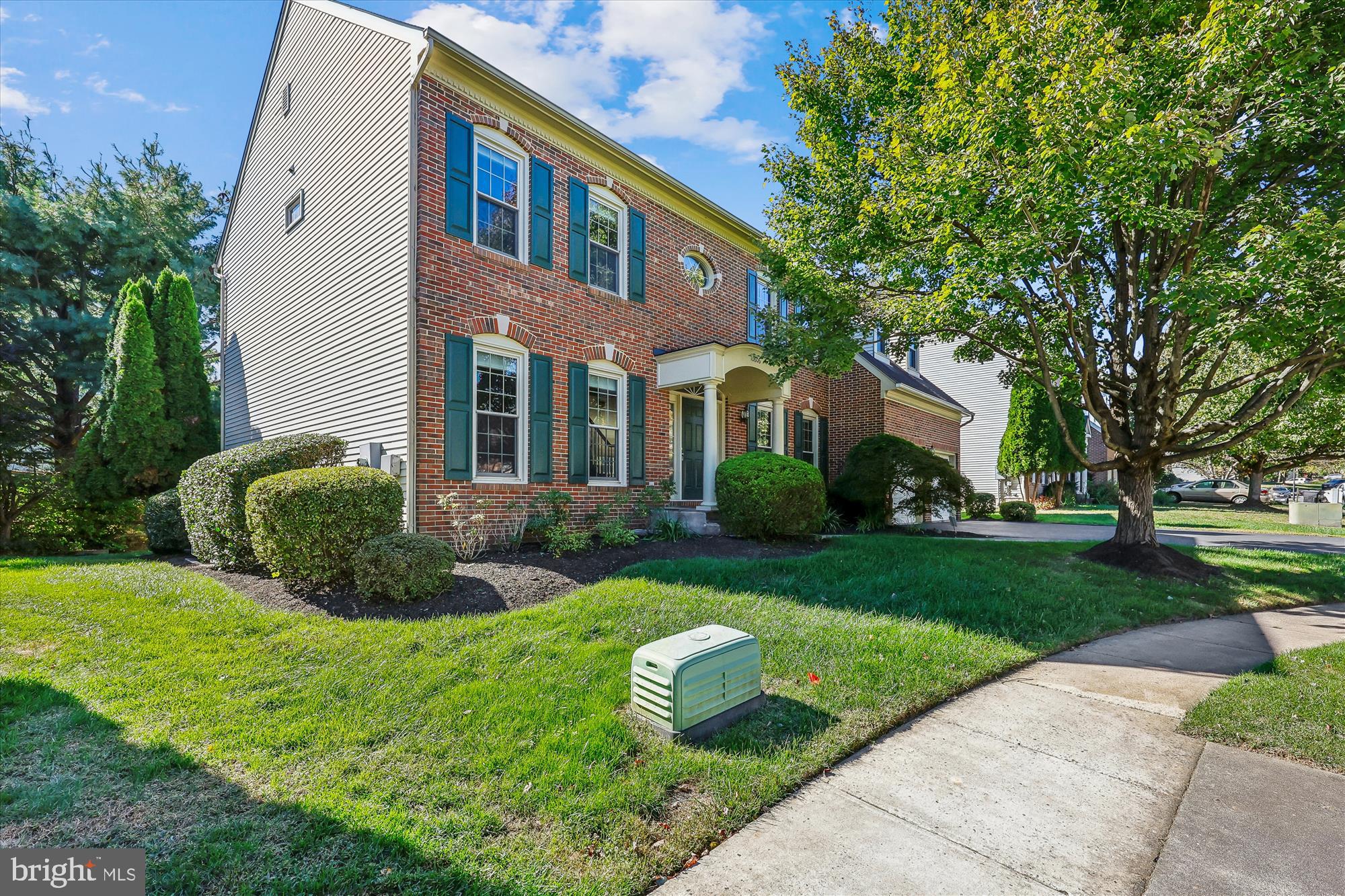 10606 Maplecrest Lane Potomac, MD 20854 - Photo 47 of 47 a front view of a house with a yard and garage