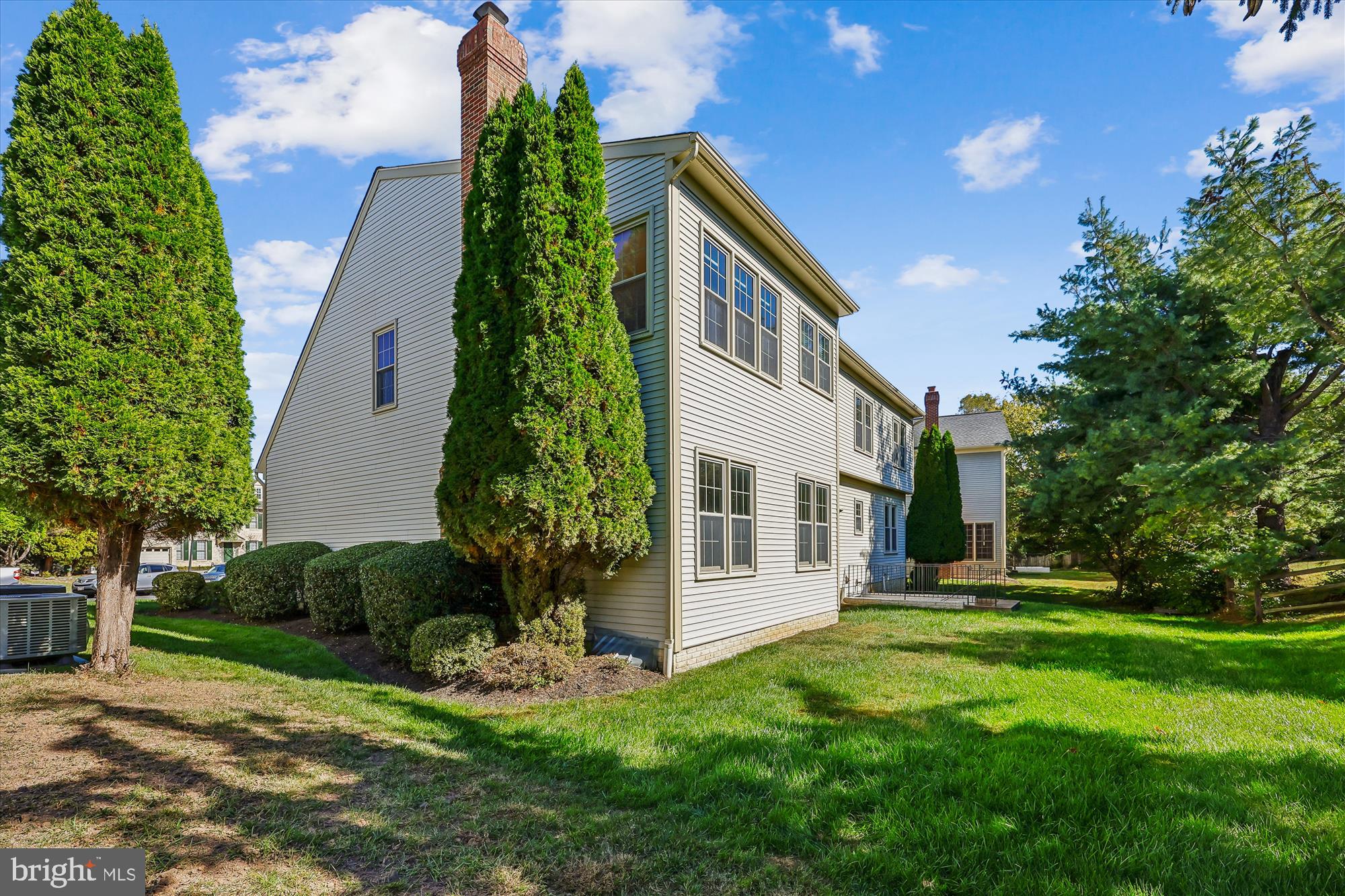10606 Maplecrest Lane Potomac, MD 20854 - Photo 5 of 47 a front view of a house with a yard