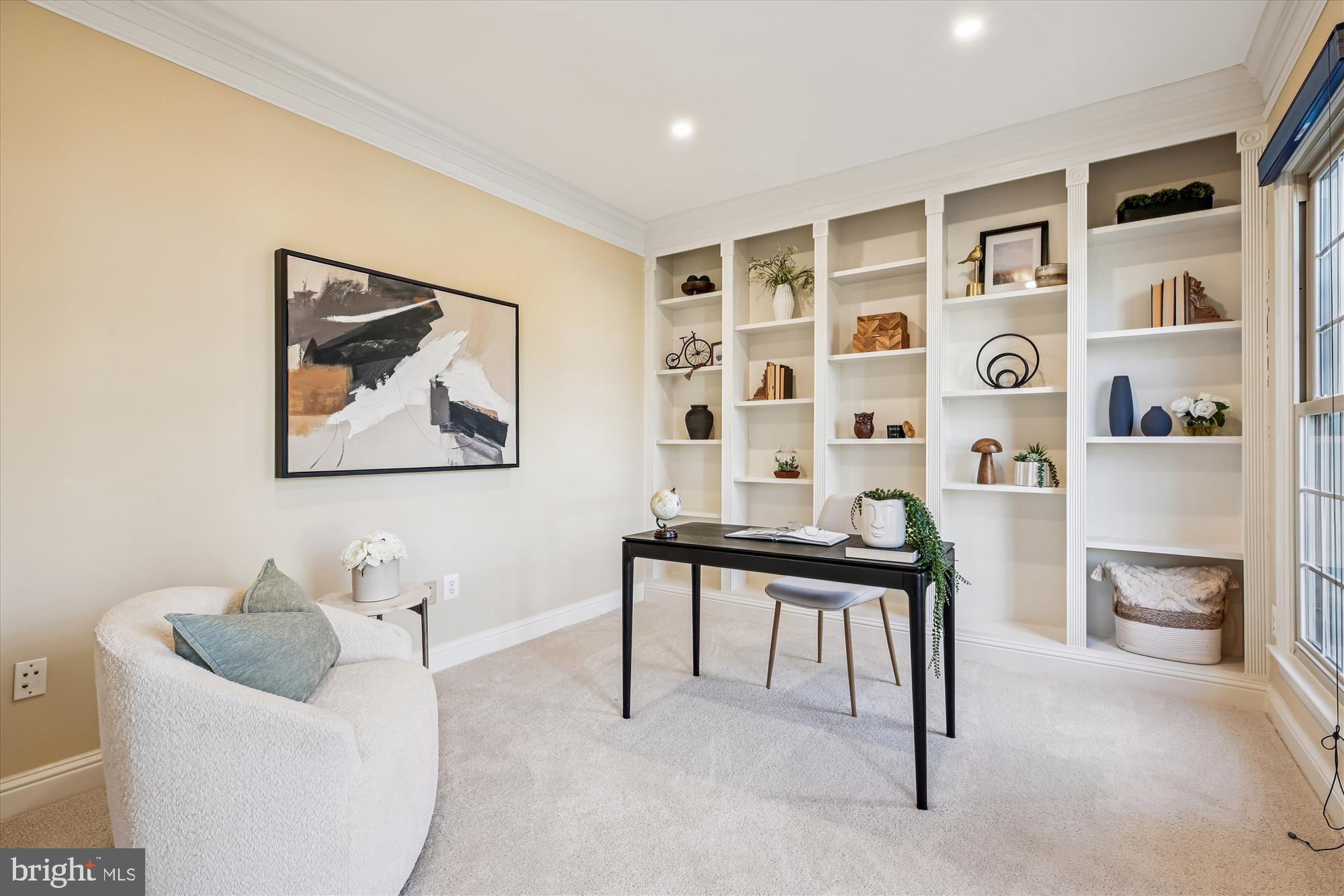 10606 Maplecrest Lane Potomac, MD 20854 - Photo 9 of 47 a living room with furniture and a table