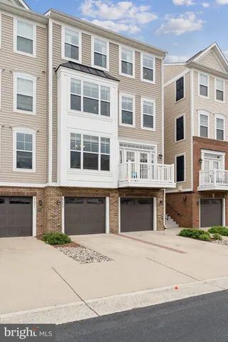 a front view of a building with a road