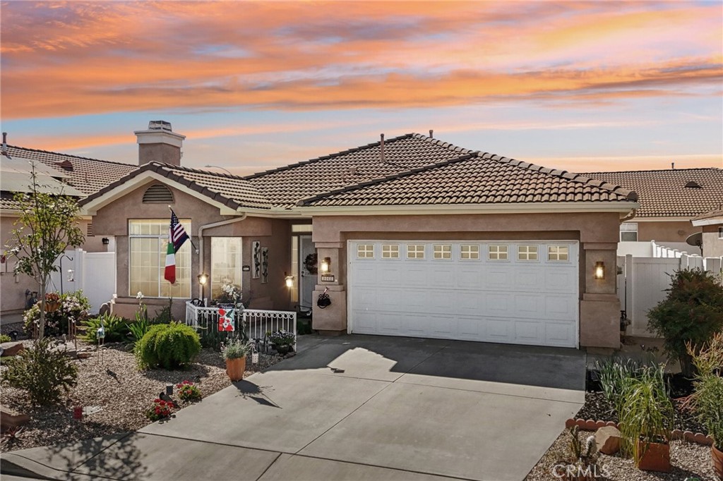 26923 Circus Menifee, CA 92585 - Photo 1 of 1 a front view of a house with garden