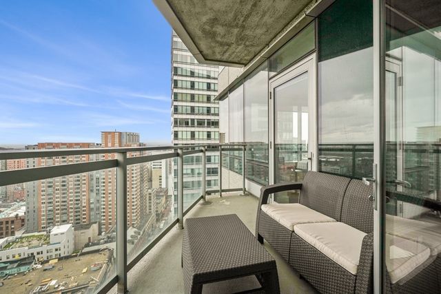 a balcony with furniture
