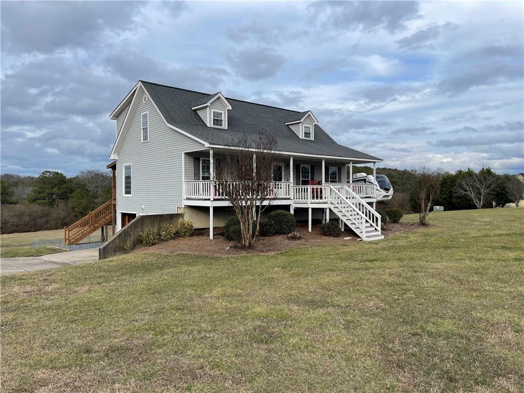 294 Robinson Road Cedartown, GA 30125 - Photo 1 of 1 a view of a house with a yard and sitting area