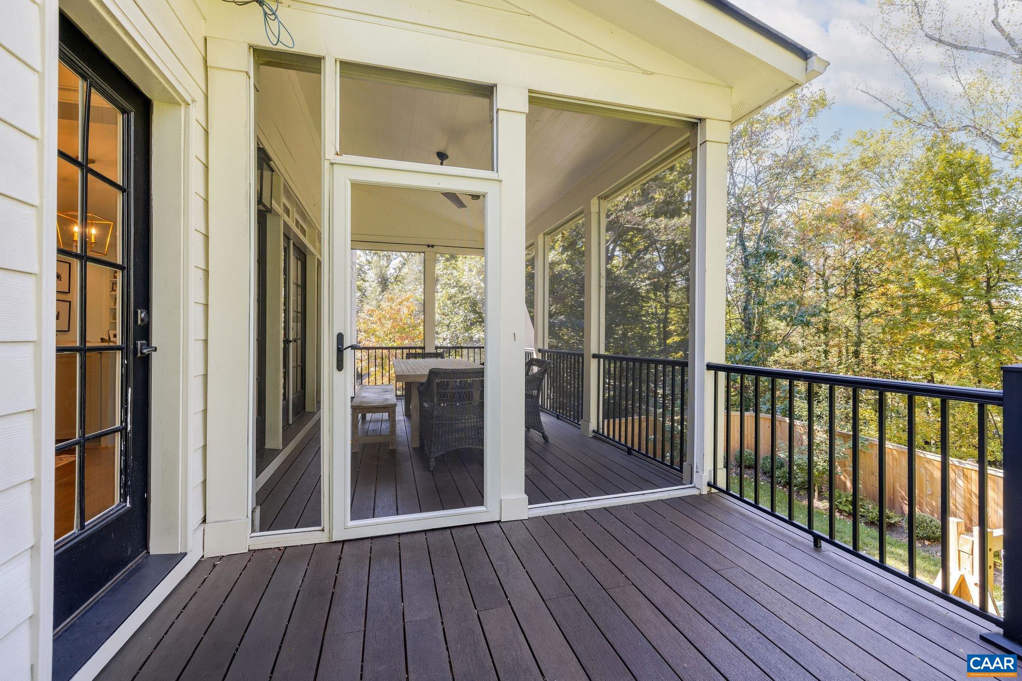 1421 Dairy Road Charlottesville, VA 22903 - Photo 20 of 57 a view of a porch with wooden floor and outdoor space