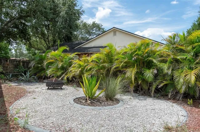 a view of a plants in front of house