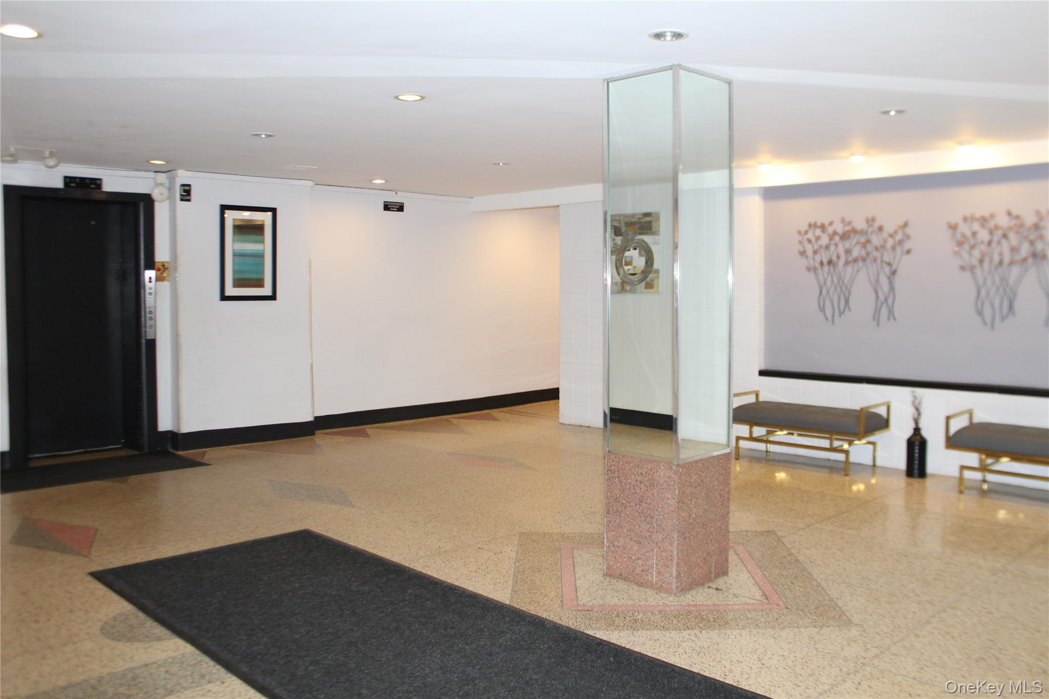 4315 Webster Avenue, Unit 3B Bronx, NY 10470 - Photo 12 of 13 a view of a kitchen with a refrigerator and mirror