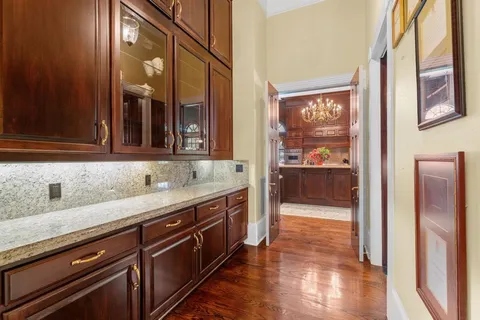 a kitchen with stainless steel appliances granite countertop a stove and a sink