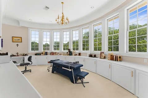 a view of living room kitchen and utility room