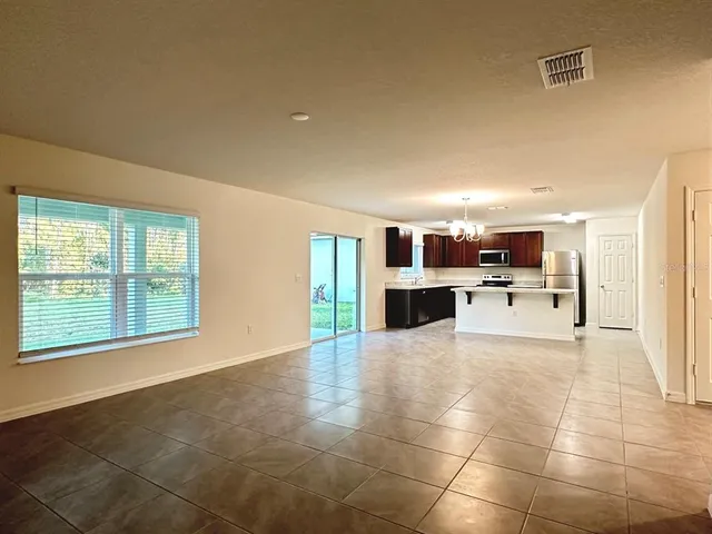 a view of a kitchen with a sink